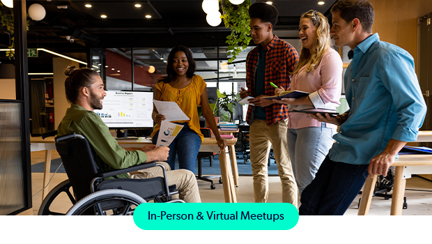 A group of professionals meeting in a modern office